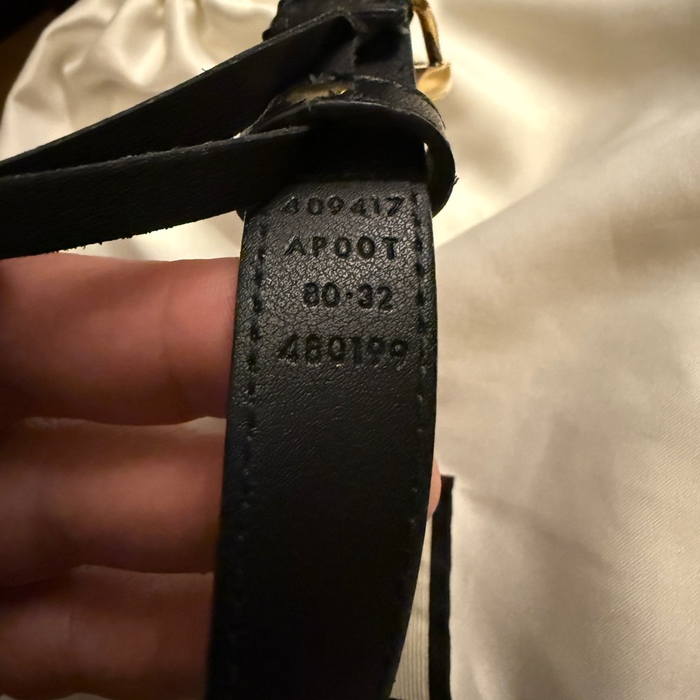 Black Gucci belt size 80/32 with gold buckle